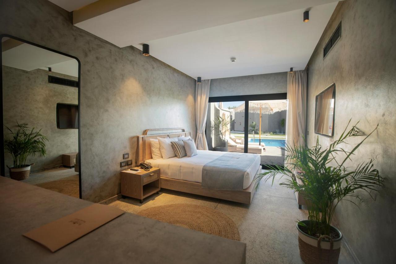 Sunrise Tucana Resort Grand Select Hurgada Dış mekan fotoğraf A bedroom at the hotel